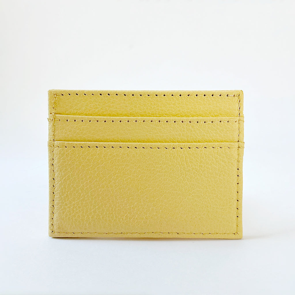 Tarjetero amarillo Amore