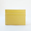 Tarjetero amarillo Amore